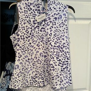 2 piecesTommy Bahama new with tags. Sleeveless printed top and matching skort